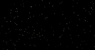 Siyah arkaplanda uçan toz parçacıkları