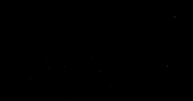 Siyah arkaplanda uçan toz parçacıkları