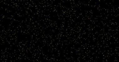 Siyah arkaplanda uçan toz parçacıkları