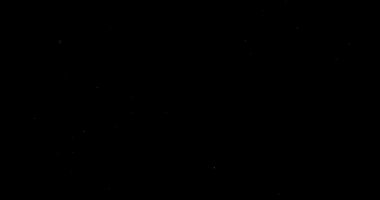 Siyah arkaplanda uçan toz parçacıkları