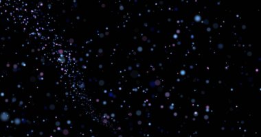 Siyah arkaplanda uçan toz parçacıkları