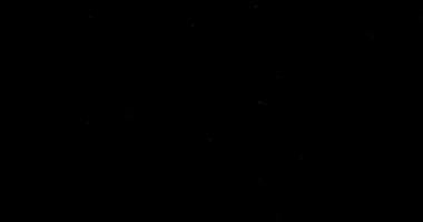 Siyah bir arkaplanda soyut uçan toz parçacıkları