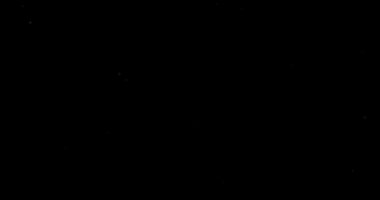 Siyah bir arkaplanda soyut uçan toz parçacıkları