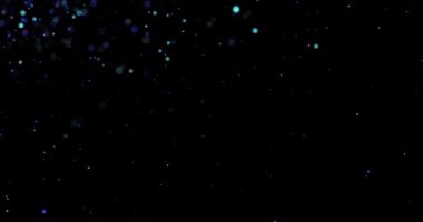 Siyah bir arkaplanda soyut uçan toz parçacıkları