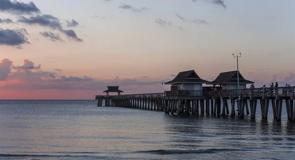 Pier jetty at sunset in Naples, forida, usa — Stock Photo, Image