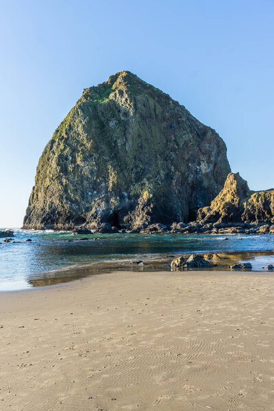 A view of the famous Haystack Rock Monolith in Cannon Beach, Oregon.