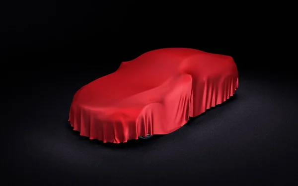 Автомобіль вкритий червоною тканиною — стокове фото