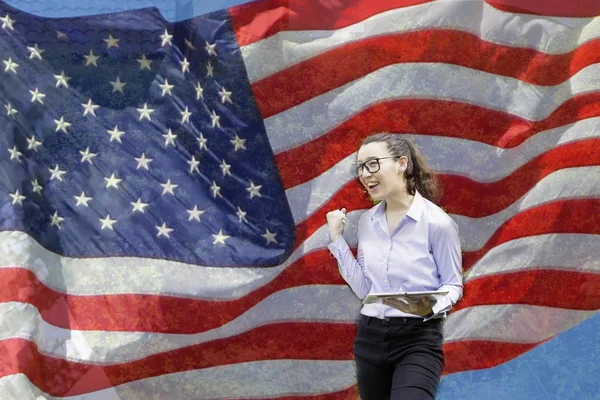 Patriotic composite of happy young half Thai-American woman in h — Stock Photo, Image