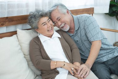 Portrait of elderly senior asian couple happy together at home.