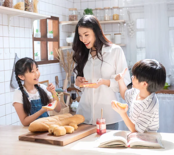 Happy Asian Family Kitchen Mother Son Daughter Spread Strawberry Yam — Stock Photo, Image