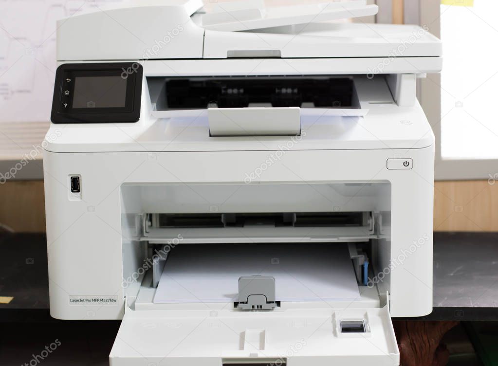 White printer and paper