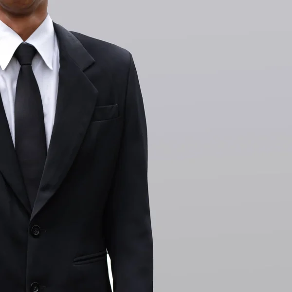 Traje hombre de negocios y fondo color gris . —  Fotos de Stock