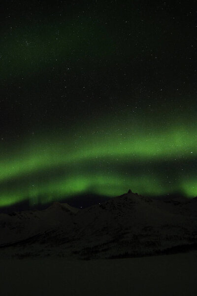 Северное сияние рядом с Тромсо, Норвегия
