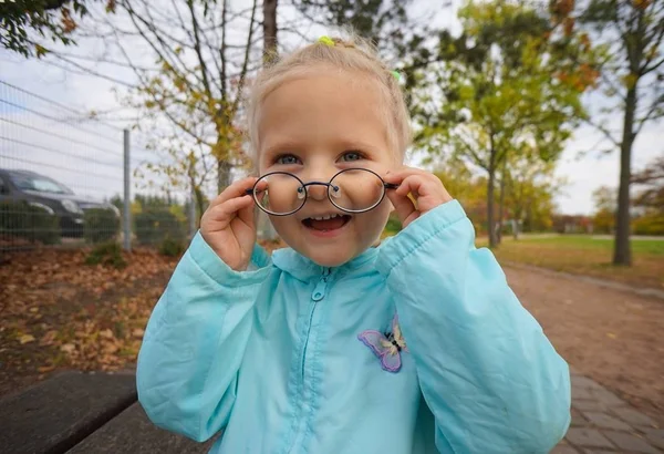 Baby girl wearing glasses — Stock Photo, Image