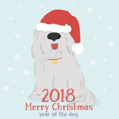 Dekoratif bir Ren geyiği ve Noel topları ile tüylü köpek.