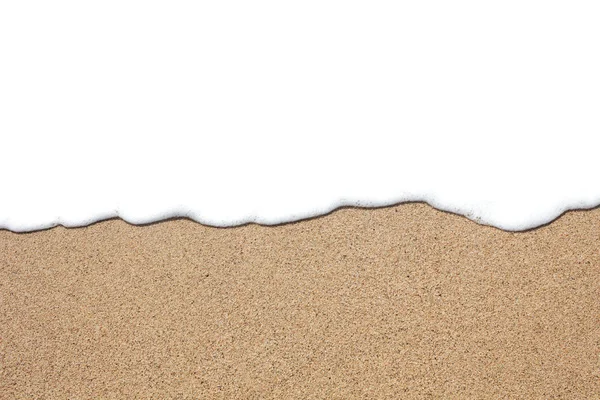 Жовтий пісок з хвилею води і порожній простір для тексту — стокове фото