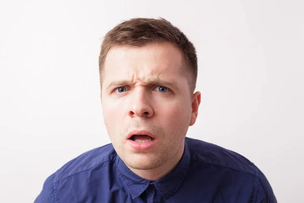 Unsure expression on caucasian man's face — Stock Photo, Image