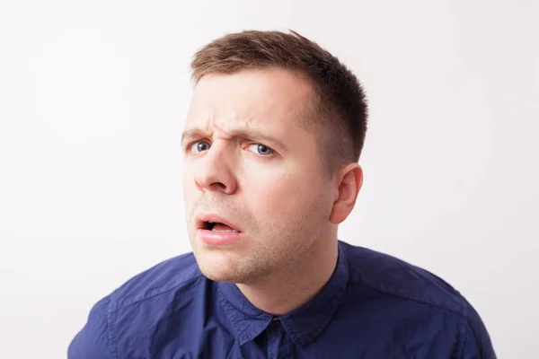 Shocked man looks forward — Stock Photo, Image