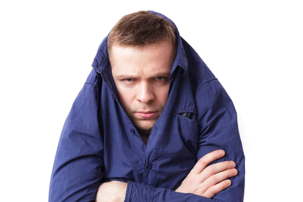 Young man hiding in a blue shirt — Stock Photo, Image