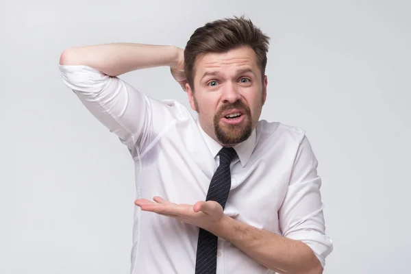 Mature caucasian male manager notices sweat under armpit before important meeting. — Stock Photo, Image