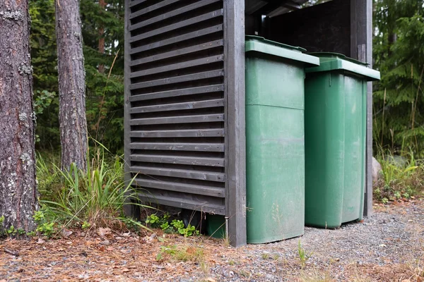 Green recycle bins outdoor for collecting garbage — Stock Photo, Image