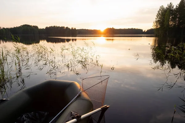 Runner boat on clean lake ready for fishing.