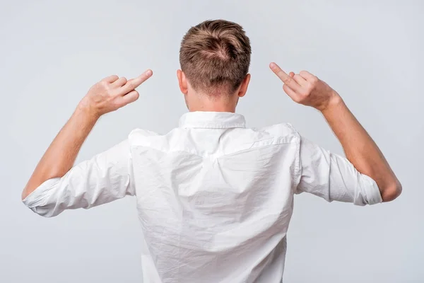 Caucasian man showing fuck you sign. Rear view. — Stock fotografie