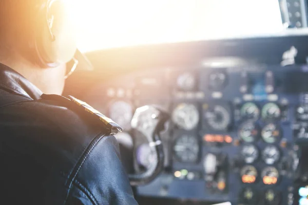 commercial pilot wearing headset