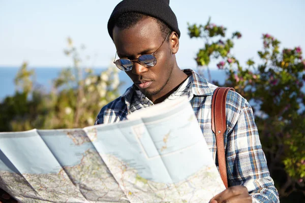 black student trying to find right way on guide