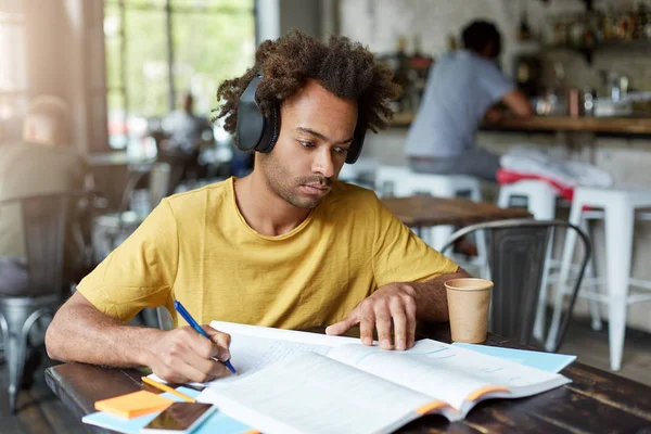 guy doing his home assignment