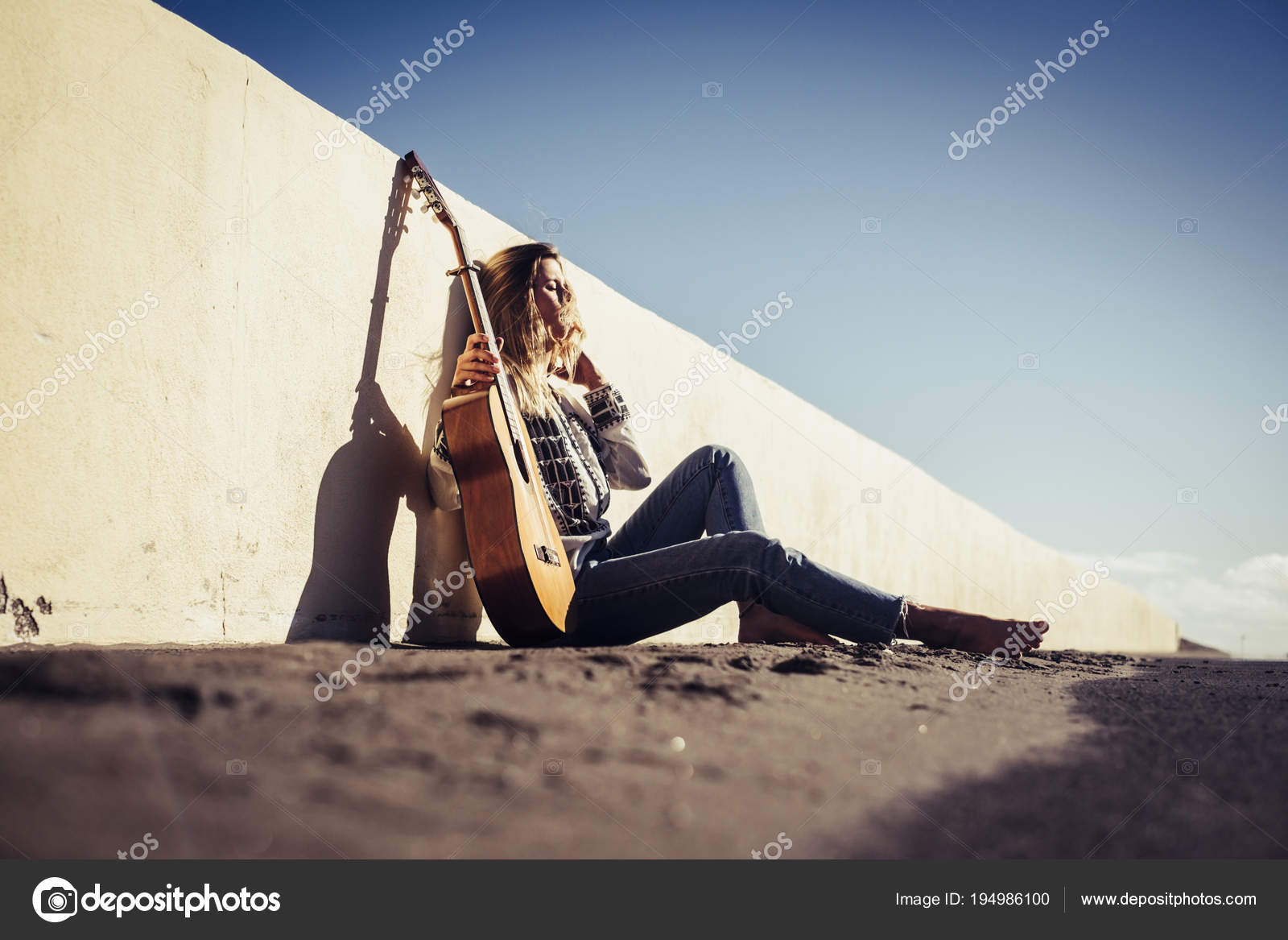 Young Beautiful Woman Sit Road Hippy Vagabond Traveler Style Stock Photo by ©simonapilolla 194986100