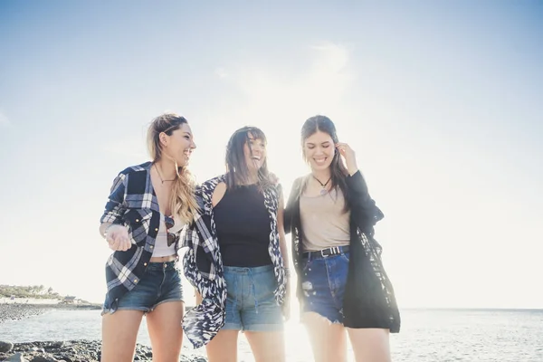 Group Three Young Woman Enjoy Summer Rock Beach Tenerife Hug — Stock Photo, Image