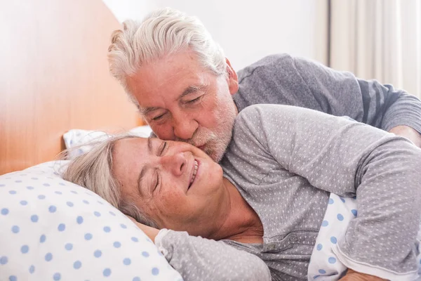 Couple Senior Man Woman Waking Smiling Hug While Bed Home — Stock Photo, Image