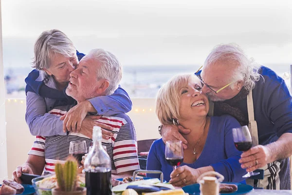 Elderly Gentlemen Gray Hair Hug Kiss While Sitting Table Terrace — Stock Photo, Image