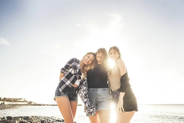 Group Three Young Woman Enjoy Summer Rock Beach Tenerife Hug — Stock Photo, Image