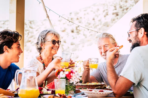 Happy Cheerful Mixed Ages Generation Family Stay Together Eating Lunch — Foto Stock