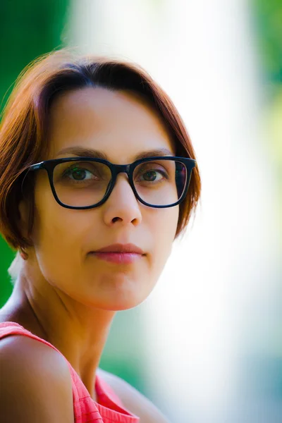 Portrait of a girl in glasses. — Stock Photo, Image