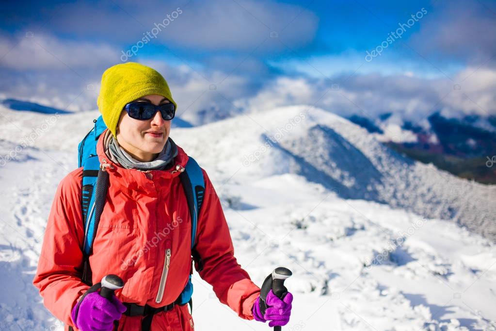 Portrait of a girl during climbing the mountain.