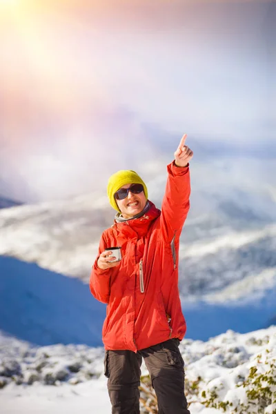 Hiker with a thermos in his hands. — Stock Photo, Image
