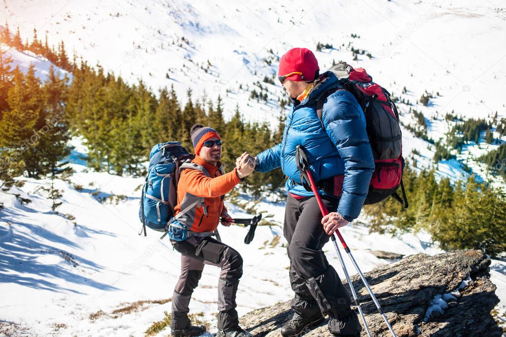 Two climbers in the mountains.