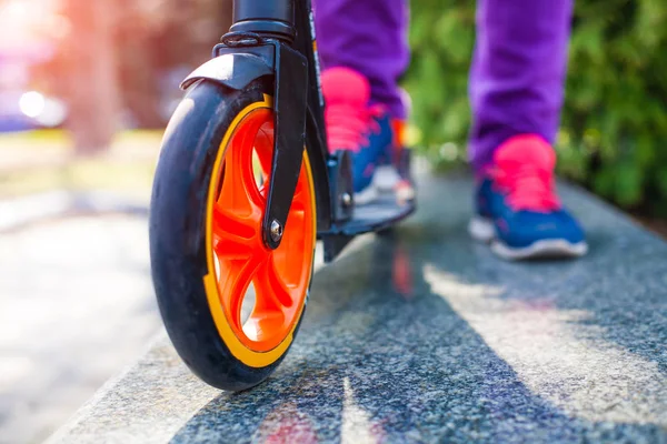 Feet on the scooter. — Stock Photo, Image