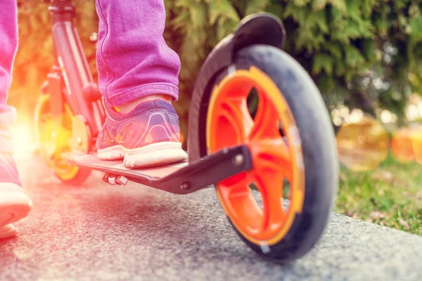 Feet on the scooter. — Stock Photo, Image