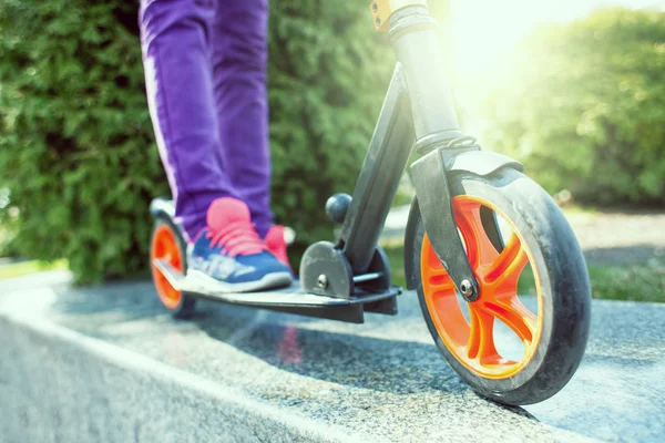 Feet on the scooter. — Stock Photo, Image