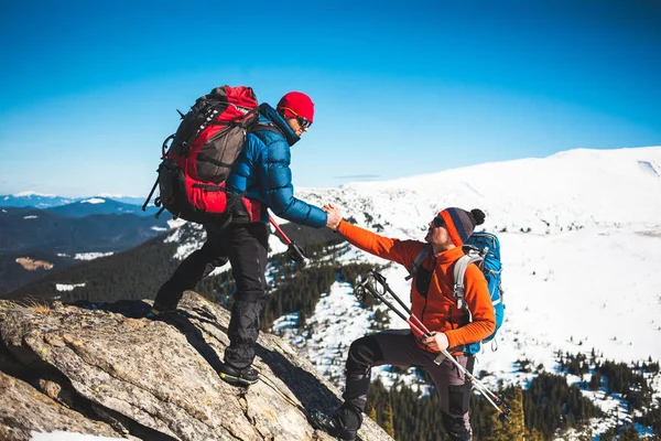 Two climbers in the mountains.