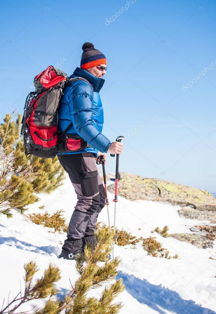 Climber in the mountains in winter.