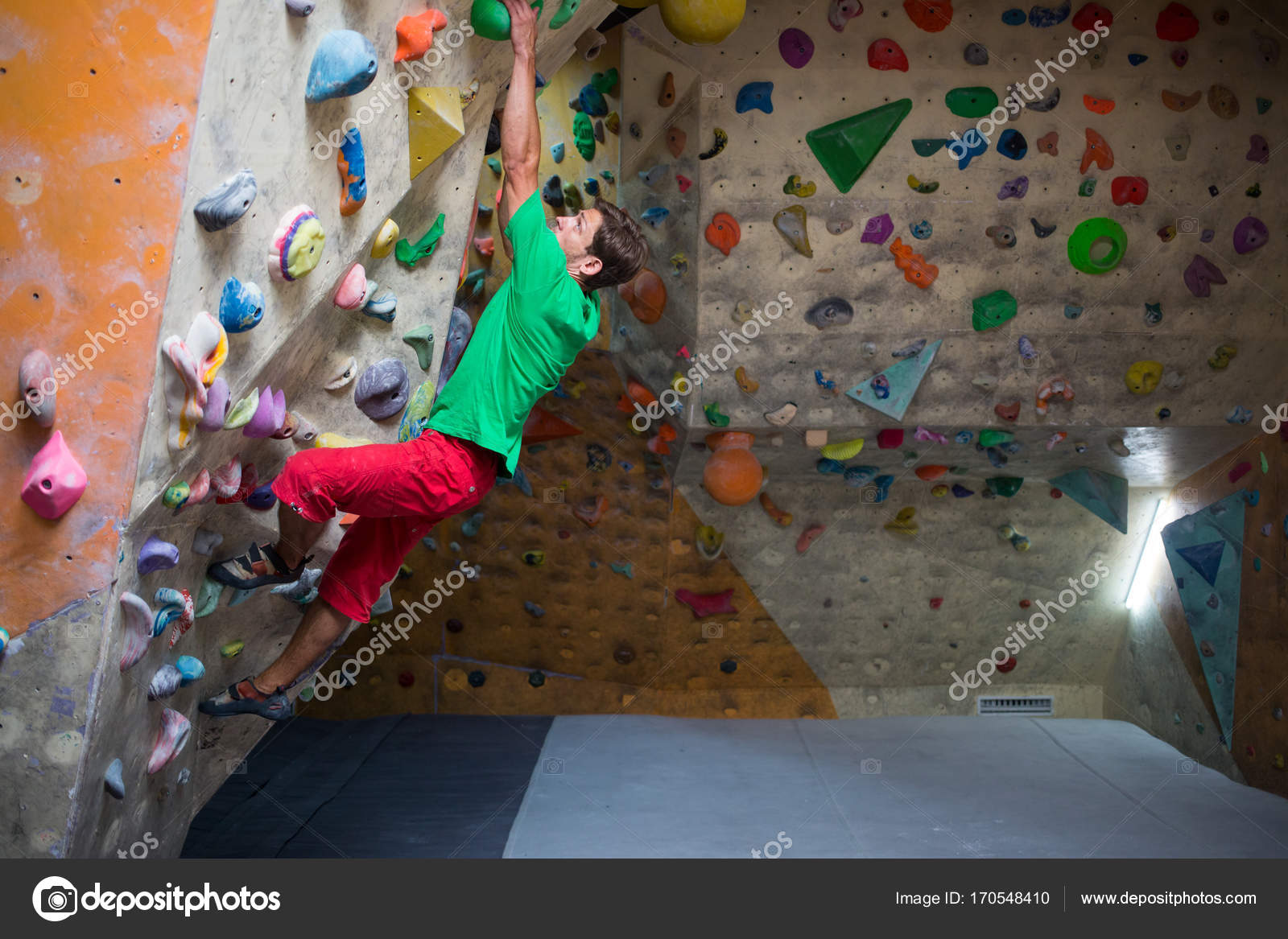 Climber trains at the climbing wall. Stock Photo by ©zhukovvvlad 170548410