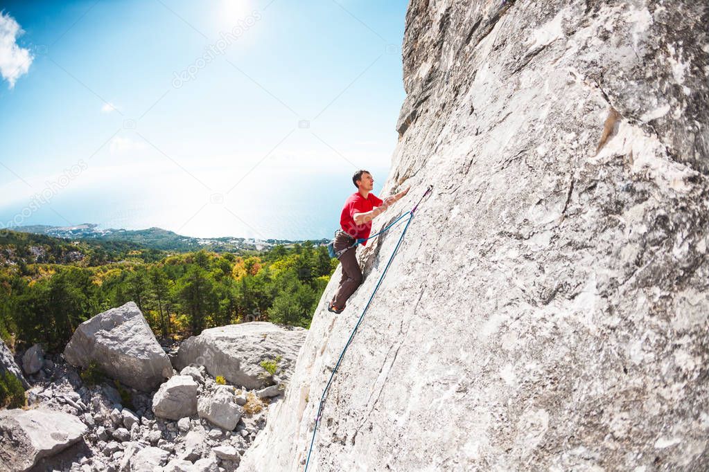 A rock climber on a rock.