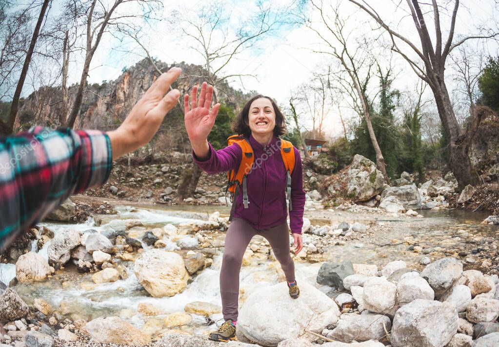 Girl greets friend.