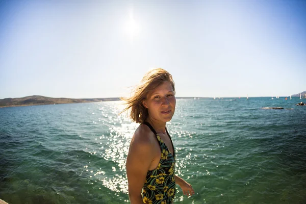 Portrait of a woman near the sea. — Stockfoto