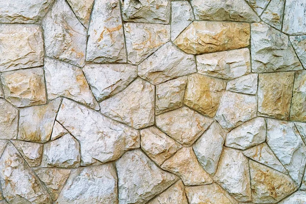 Fundo de uma textura de parede de pedra. Alvenaria bonita — Fotografia de Stock